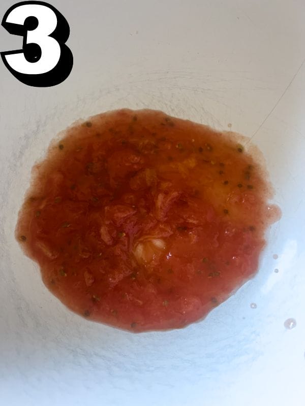 Transfer tomato paste to the bowl